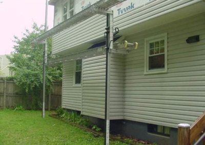 a view of the yard of a house undergoing new construction