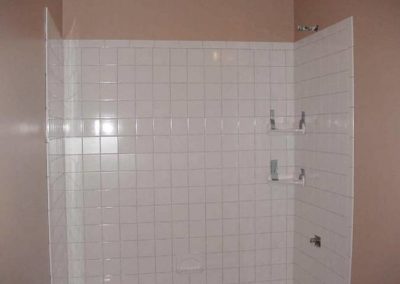 interior of a bathroom with tiles installed