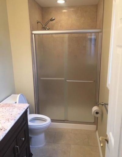 view of closed door of shower glass