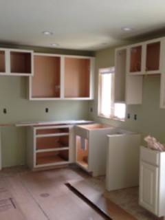 view of the wooden cabinets during renovation work in the kitchen