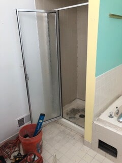 side view of shower with the glass door