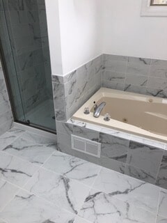 view of the bathtub after remodeling and renovation