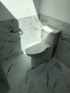 view of the toilet after remodeling