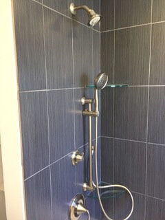 corner view of shower in the bathroom