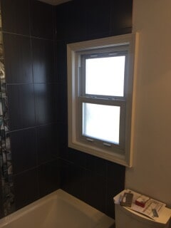 corner view of window in bathroom